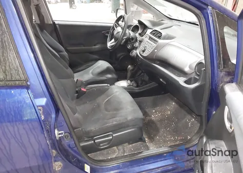 2009 Honda Fit Sport z USA, uszkodzony, nr VIN JHMGE884X9S016583